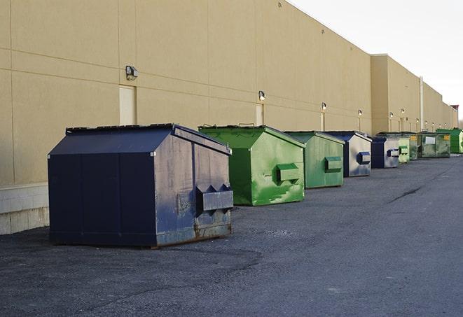 dumpsters lined up waiting to be filled with construction waste in Cardinal, VA